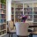 library with a table with flowers on it