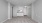 living area with carpet and grey walls