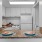 a kitchen with two placemats on a bar