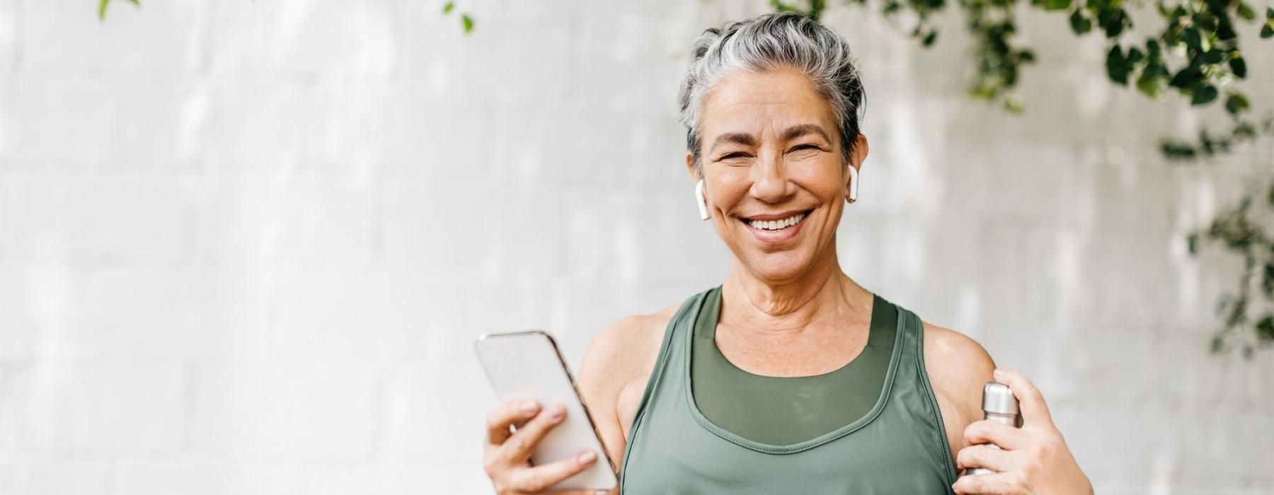 a woman holding a phone